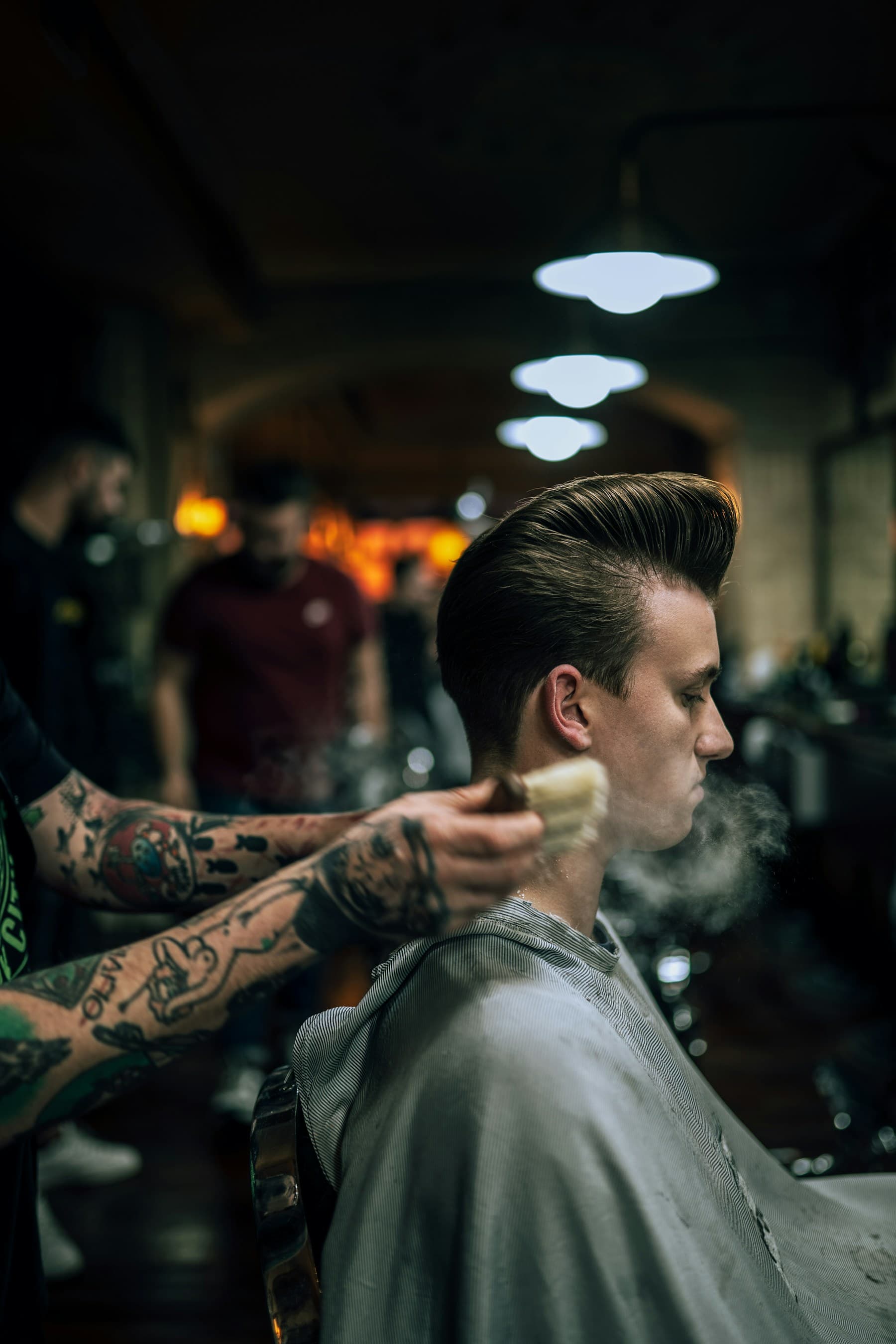Barber finishing a classic haircut