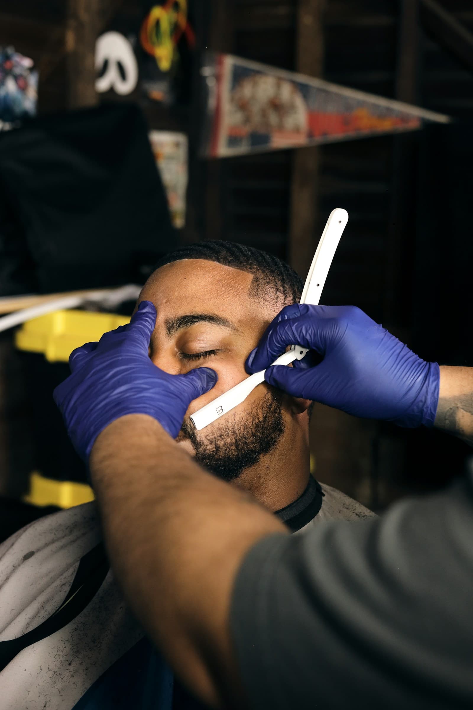 Barber working on a client's fade